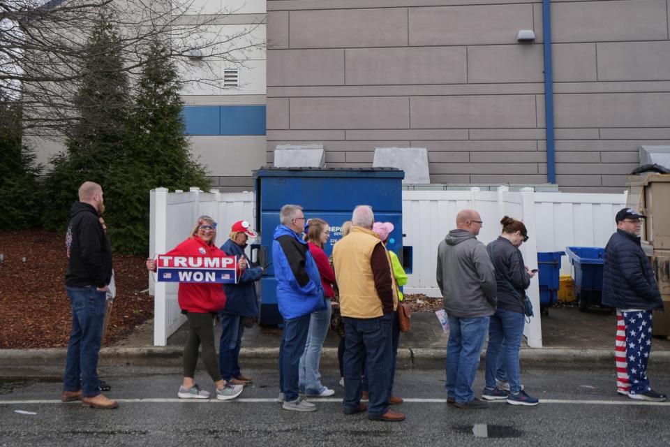 Supporters line up to hear Republican presidential candidate Donald Trump speak in Greensboro, North Carolina Saturday morning.