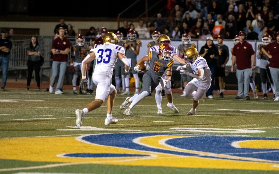 Rocky Mountain football's senior tight end Charlie Sparks (6) breaks through the defense for a long touchdown in the second quarter against crosstown rival Fort Collins on Friday Sept. 29, 2023 at French Field.