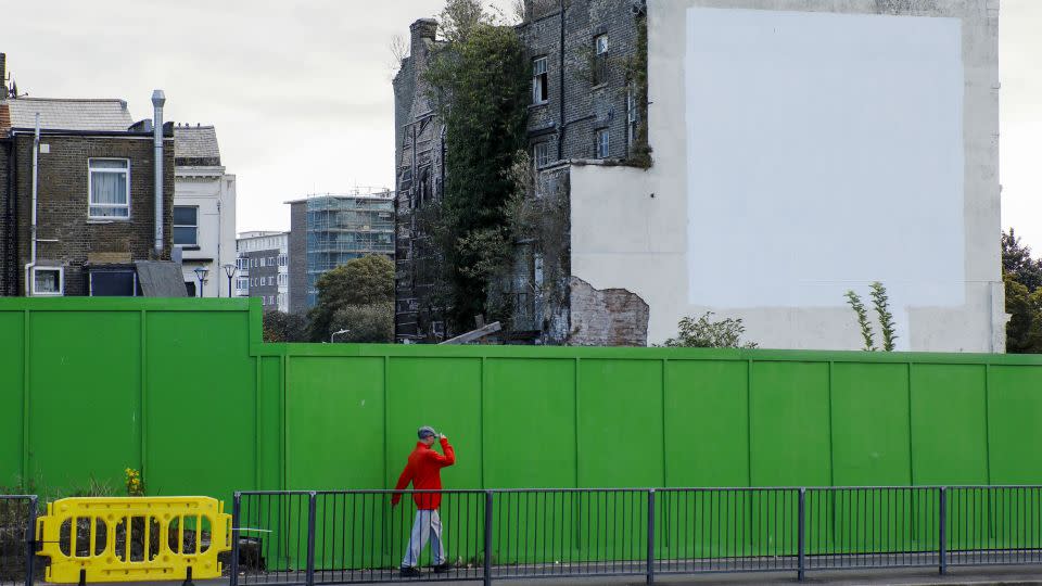 The mural was whitewashed in 2019 but efforts had been made to try and conserve some of the artwork beneath the paint. - Luke MacGregor/Bloomberg/Getty Images