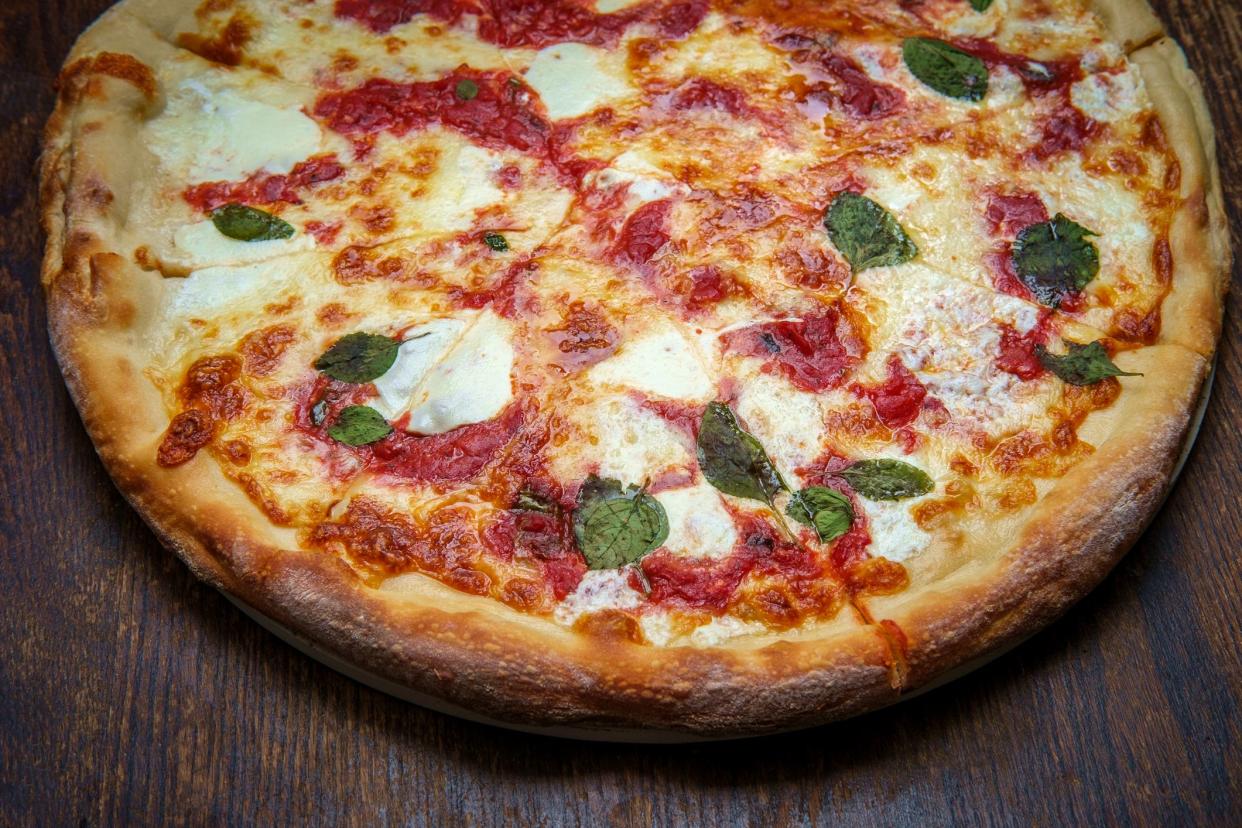 <p><br></p><p>When you think of pizza, this is what you most likely think of! Big, cheesy slices cut from thin-crusted round pies or thicker-crusted Sicilian-style pizzas and devoured while taking a stroll down the sidewalk. For a virtual trip to a New York street corner, look no further than these iconic <a href="https://www.goldbelly.com/foods/new-york-style-pizza/?utm_source=blog&utm_medium=regional+pizza+styles&utm_campaign=ny+pizza" rel="nofollow noopener" target="_blank" data-ylk="slk:New York style pizza;elm:context_link;itc:0;sec:content-canvas" class="link rapid-noclick-resp">New York style pizza</a> purveyors:</p><ul><li><a href="https://www.goldbelly.com/restaurants/di-fara-pizza" rel="nofollow noopener" target="_blank" data-ylk="slk:Di Fara;elm:context_link;itc:0;sec:content-canvas" class="link rapid-noclick-resp">Di Fara</a></li><li><a href="https://www.goldbelly.com/restaurants/totonnos" rel="nofollow noopener" target="_blank" data-ylk="slk:Totonno’s;elm:context_link;itc:0;sec:content-canvas" class="link rapid-noclick-resp">Totonno’s</a></li><li><a href="https://www.goldbelly.com/restaurants/grimaldi-s-pizzeria" rel="nofollow noopener" target="_blank" data-ylk="slk:Grimaldi’s;elm:context_link;itc:0;sec:content-canvas" class="link rapid-noclick-resp">Grimaldi’s</a></li><li><a href="https://www.goldbelly.com/restaurants/lombardis-pizza" rel="nofollow noopener" target="_blank" data-ylk="slk:Lombardi’s;elm:context_link;itc:0;sec:content-canvas" class="link rapid-noclick-resp">Lombardi’s</a></li><li><a href="https://www.goldbelly.com/restaurants/joe-and-pats-pizzeria" rel="nofollow noopener" target="_blank" data-ylk="slk:Joe & Pat’s;elm:context_link;itc:0;sec:content-canvas" class="link rapid-noclick-resp">Joe & Pat’s</a></li><li><a href="https://www.goldbelly.com/restaurants/johns-of-bleecker-street" rel="nofollow noopener" target="_blank" data-ylk="slk:John’s of Bleecker Street;elm:context_link;itc:0;sec:content-canvas" class="link rapid-noclick-resp">John’s of Bleecker Street</a></li><li><a href="https://www.goldbelly.com/restaurants/table-87" rel="nofollow noopener" target="_blank" data-ylk="slk:Table 87;elm:context_link;itc:0;sec:content-canvas" class="link rapid-noclick-resp">Table 87</a></li><li><a href="https://www.goldbelly.com/restaurants/tony-boloneys" rel="nofollow noopener" target="_blank" data-ylk="slk:Tony Boloney’s;elm:context_link;itc:0;sec:content-canvas" class="link rapid-noclick-resp">Tony Boloney’s</a></li><li><a href="https://www.goldbelly.com/restaurants/christian-petroni" rel="nofollow noopener" target="_blank" data-ylk="slk:Christian Petroni;elm:context_link;itc:0;sec:content-canvas" class="link rapid-noclick-resp">Christian Petroni</a></li><li><a href="https://www.goldbelly.com/restaurants/mother-kellys" rel="nofollow noopener" target="_blank" data-ylk="slk:Mother Kelly’s;elm:context_link;itc:0;sec:content-canvas" class="link rapid-noclick-resp">Mother Kelly’s</a></li></ul><span class="copyright"> EzumeImages/istockphoto </span>