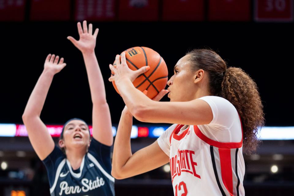 Dec 10, 2023; Columbus, OH, USA;
Ohio State Buckeyes guard Celeste Taylor (12) makes a three pointer during their game against the Penn State Nittany Lions on Sunday, Dec. 10, 2023 at Value City Arena.