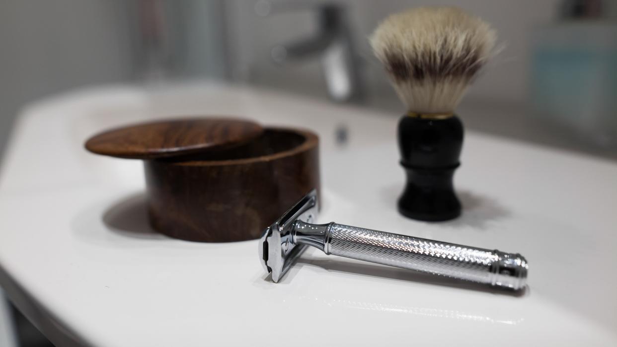 Shaving accessories in bathroom.