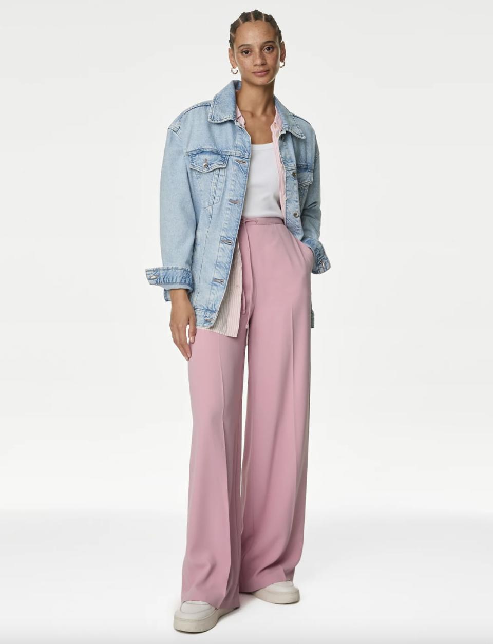 These affordable trousers come in four different shades, this powder pink hue is one of our favourites. (Marks & Spencer)