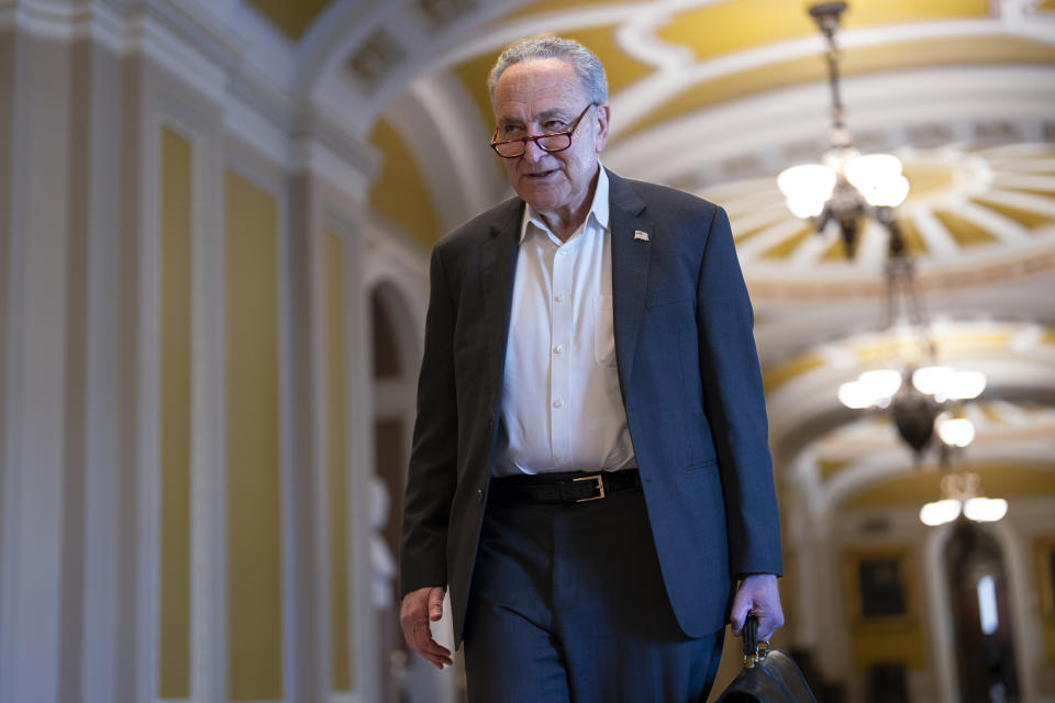 Senate Majority Leader Chuck Schumer, D-N.Y., arrives as the Senate prepares to advance the $95 billion aid package for Ukraine, Israel and Taiwan passed by the House, at the Capitol in Washington, Tuesday, April 23, 2024. (AP Photo/J. Scott Applewhite)