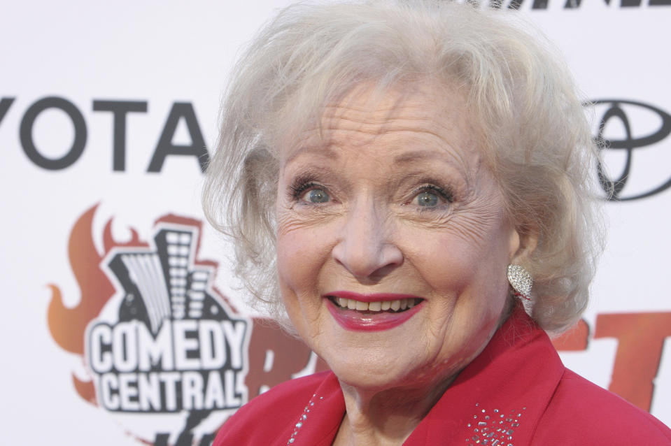 FILE - Betty White poses for photographers on the red carpet before Comedy Central's "Roast of William Shatner," Sunday, Aug. 13, 2006, in Los Angeles. Betty White, whose saucy, up-for-anything charm made her a television mainstay for more than 60 years, has died. She was 99. (AP Photo/Rene Macura, File)