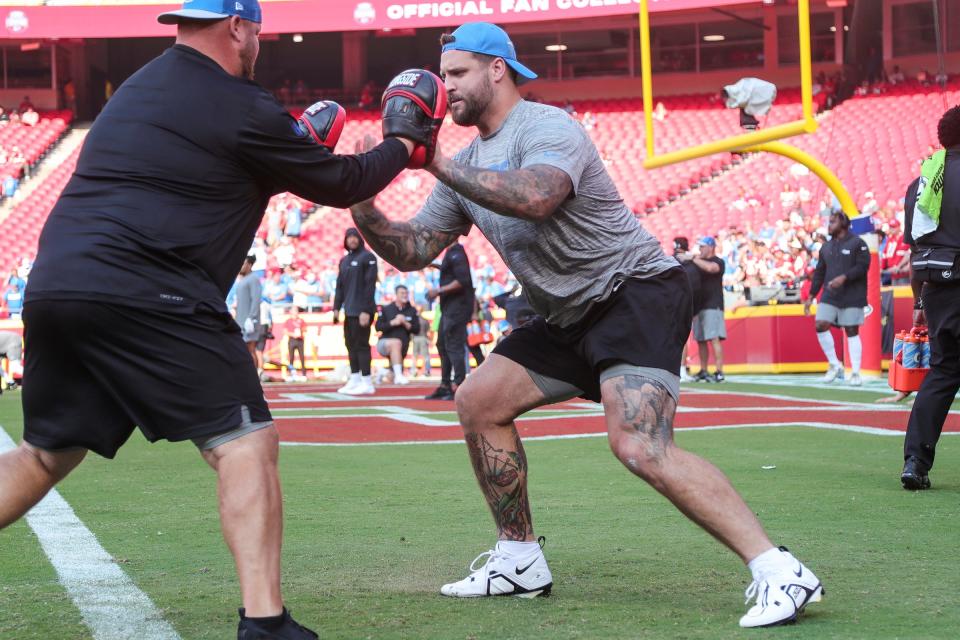 Detroit Lions offensive tackle Taylor Decker (68) warm up ahead of the season opener against the Kansas City Chiefs at Arrowhead Stadium in Kansas City, Mo. on Thursday, Sept. 7, 2023.