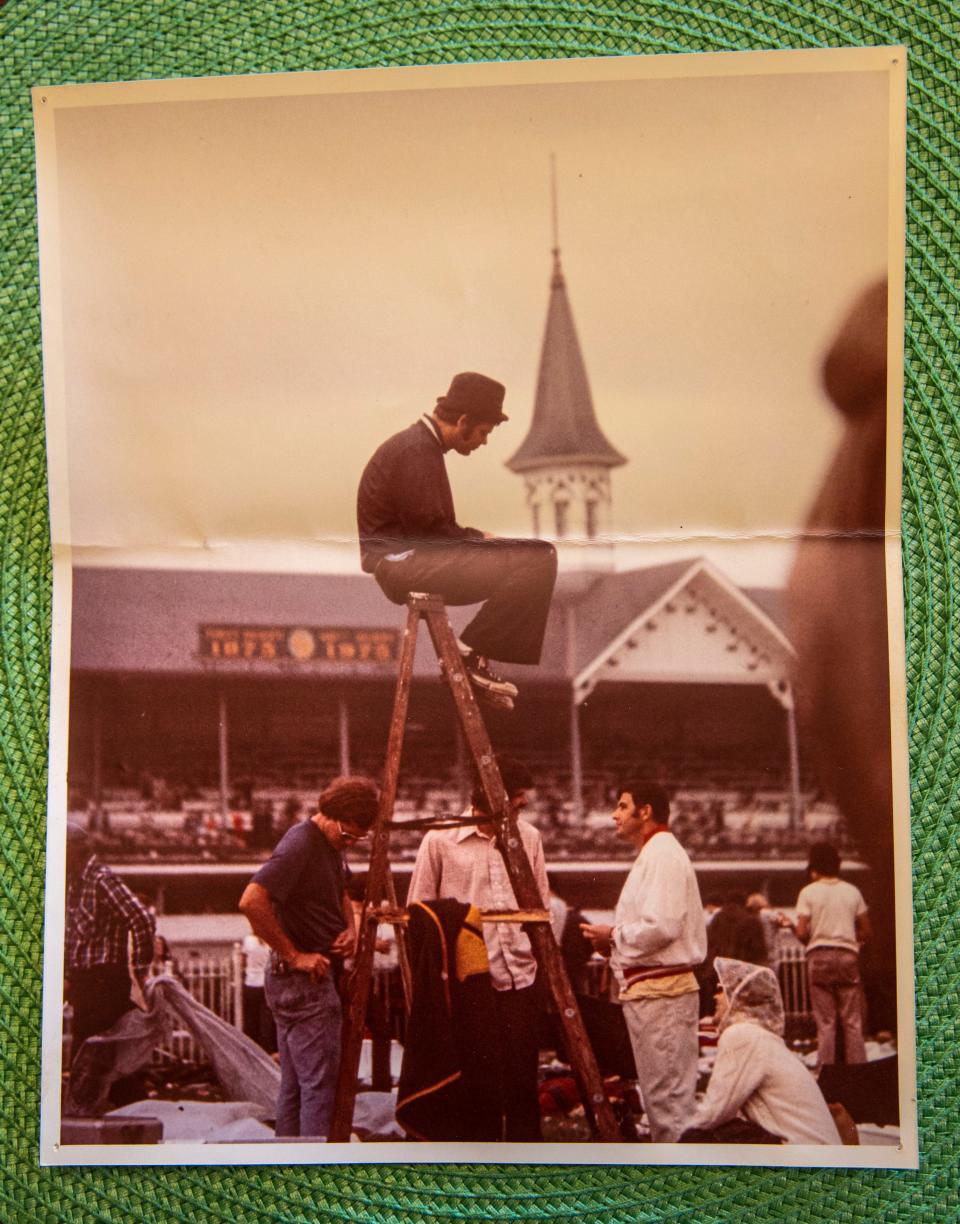 Skip Anderson has more than four decades worth of stories about his antics in the Kentucky Derby infield. Anderson is seen on the left, with his pockets bulging with quarters from proceeds he earned from a basketball goal he erected in the infield. March 22, 2022