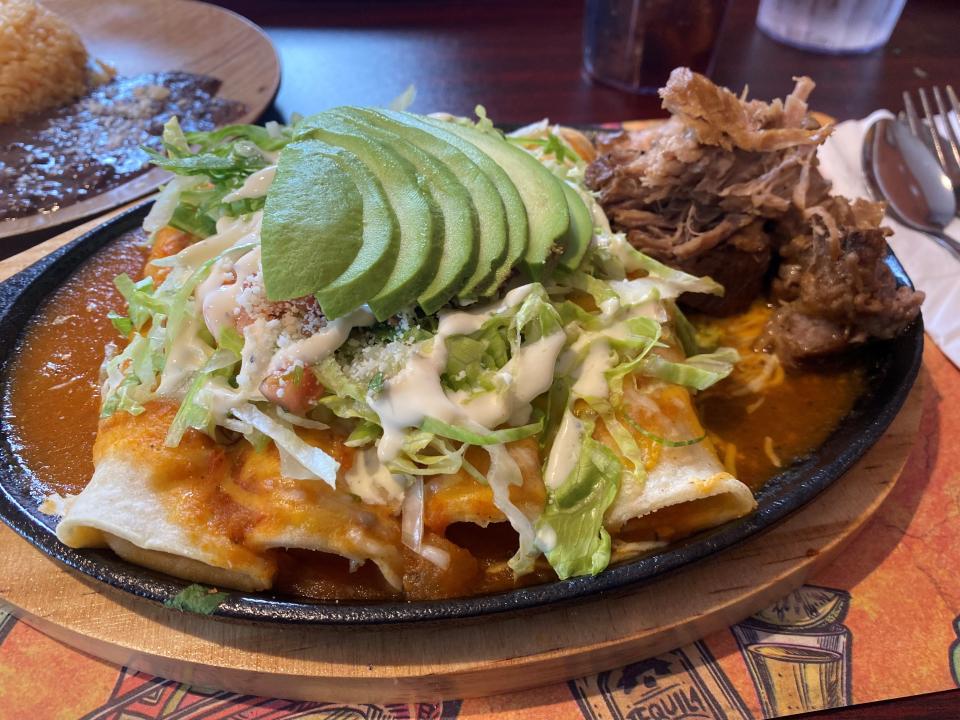 Chicken enchiladas with carnitas on the side at La Cabañita Restaurant in the Manahawkin section of Stafford.