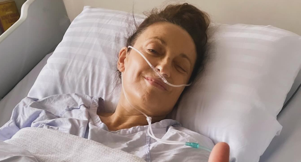 Georgie Parker from Home and Away in a hospital bed