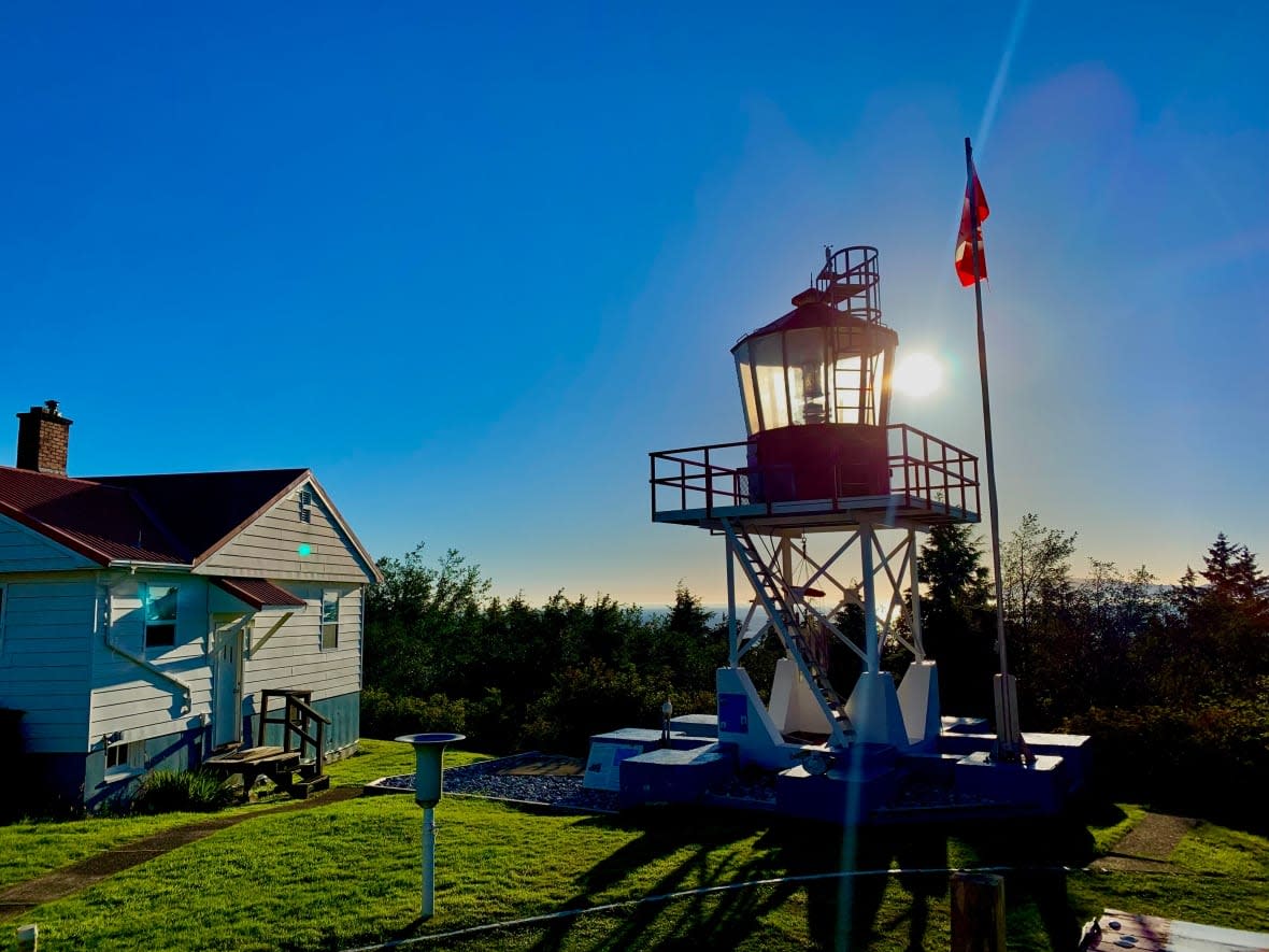 The Cape Scott lighthouse station on a calm day. The remote location on the northwest tip of Vancouver Island often experiences intense storms and heavy fog. (Harvey Humchitt Jr/submitted - image credit)