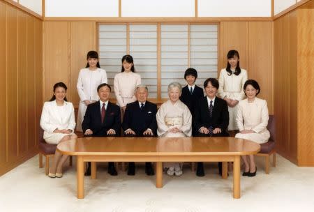 FILE PHOTO - Japanese Emperor Akihito (seated 3rd L) and Empress Michiko (seated 4th L), smile with their family members during a photo session for the New Year at the Imperial Palace in Tokyo, Japan in this handout picture taken November 28, 2016, and provided by the Imperial Household Agency of Japan. Also in the picture are Crown Prince Naruhito (seated 2nd L), his wife, Crown Princess Masako (Seated L), their daughter, Princess Aiko (top 2nd L), Prince Akishino, (Seated 2nd R), his wife, Princess Kiko (Seated R), their daughters, Princess Mako (top L), and Princess Kako (top R), and their son, Prince Hisahito (top 2nd R). Imperial Household Agency of Japan via Reuters/File Photo ATTENTION EDITORS - THIS PICTURE WAS PROVIDED BY A THIRD PARTY. FOR EDITORIAL USE ONLY. NOT FOR SALE FOR MARKETING OR ADVERTISING CAMPAIGNS.