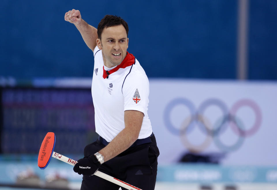 Britain’s skip David Murdoch celebrates after delivering the last rock to defeat Sweden during the men's curling semifinal game at the 2014 Winter Olympics, Wednesday, Feb. 19, 2014, in Sochi, Russia. (AP Photo/Robert F. Bukaty)