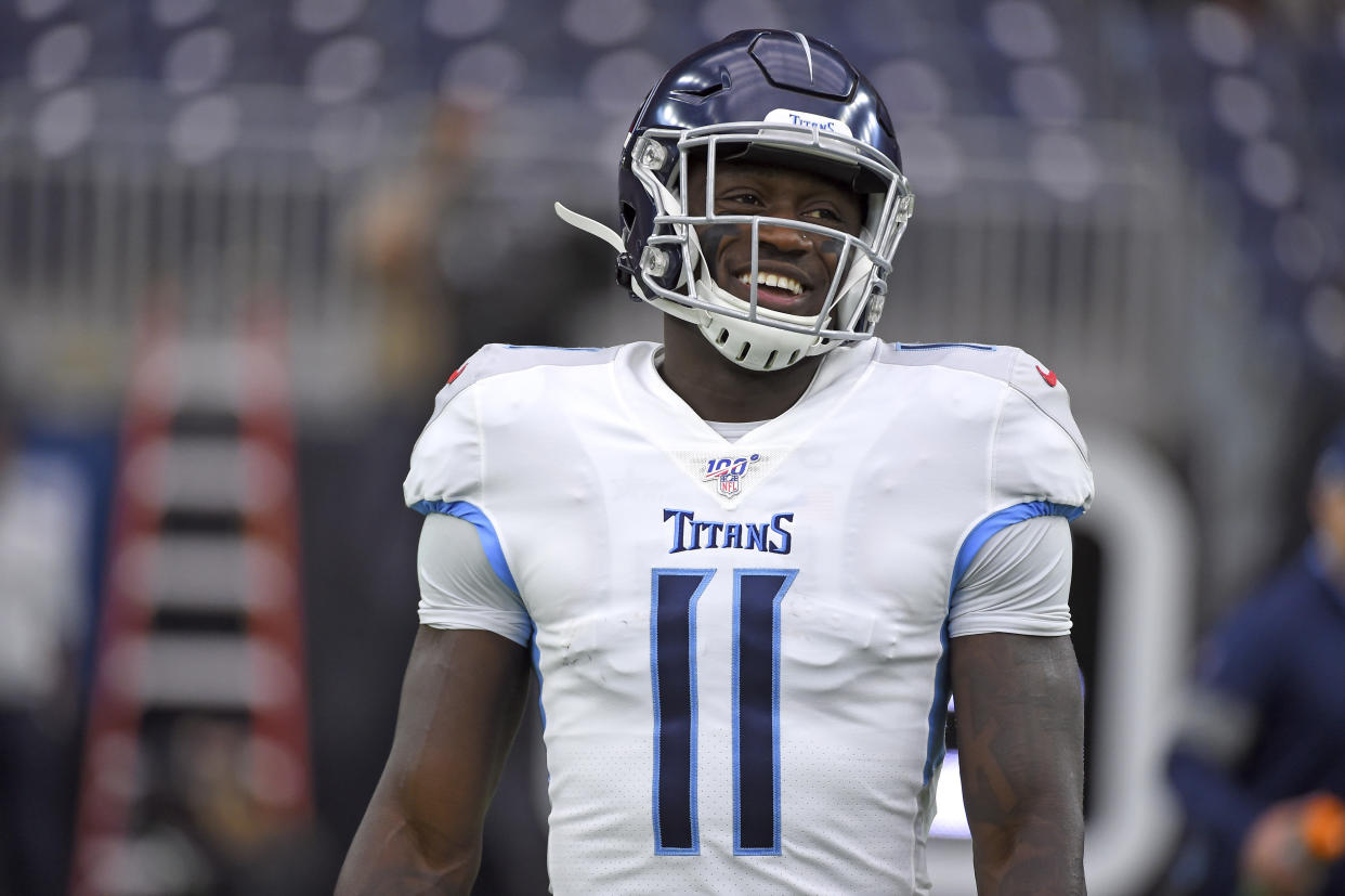 FILE - In this Dec. 29, 2019, file photo, Tennessee Titans' A.J. Brown (11) warms up before an NFL football game against the Houston Texans in Houston. Titans wide receiver A.J. Brown led all rookies in receiving yards despite working with quarterback Ryan Tannehill for only 10 games. Now Brown is going into his second season ready to show what he can do with a full 16-game schedule as Tennessee's top receiver. (AP Photo/Eric Christian Smith, File)