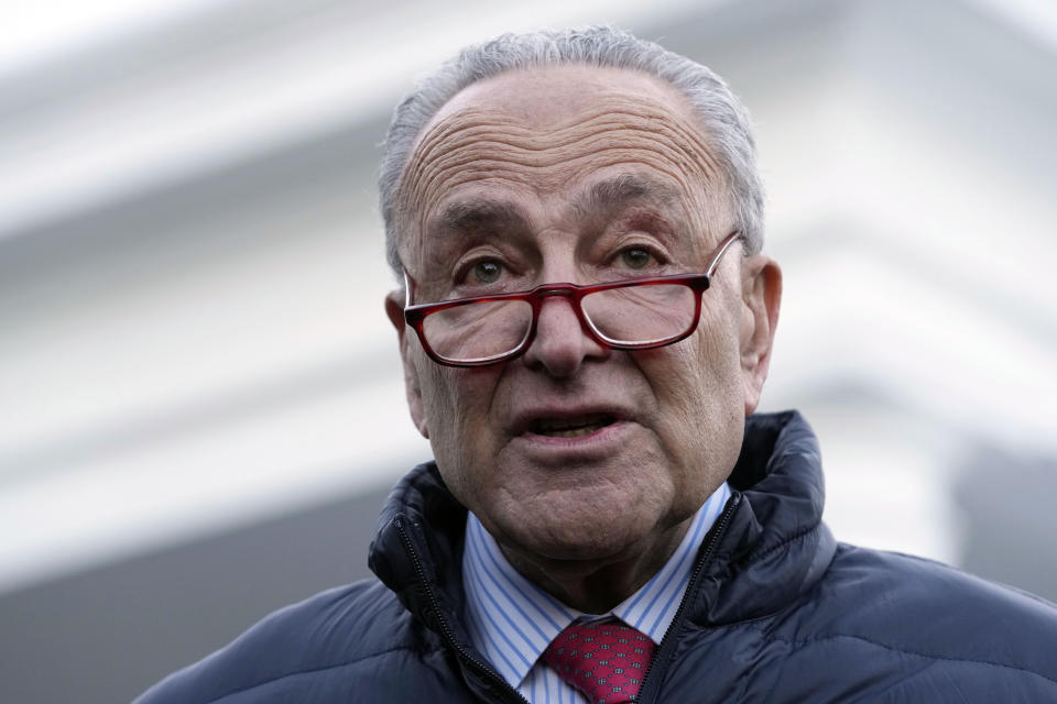 Senate Majority Leader Chuck Schumer of N.Y., right, talks to reporters outside the West Wing of the White House in Washington, Wednesday, Jan. 17, 2024, following a meeting with President Joe Biden. (AP Photo/Susan Walsh)