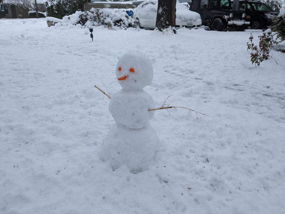 Friday morning (Feb. 24, 2023) Redding residents woke up to snow on the ground. Some people came out to play early, building this cute snowman in this Hilltop Drive neighborhood.