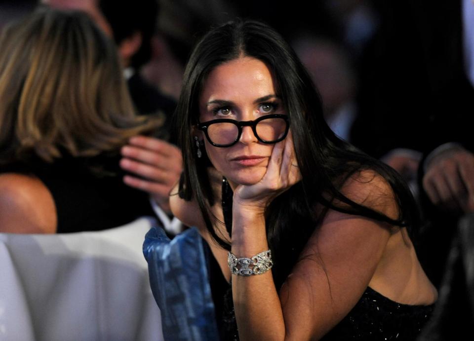 Actress Demi Moore watches a performance at the Wallis Annenberg Center for the Performing Arts Inaugural Gala on Thursday, Oct. 17, 2013, in Beverly Hills, Calif. (Photo by Chris Pizzello/Invision/AP)