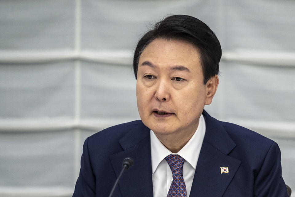 South Korea's President Yoon Suk Yeol attends a meeting between the Japan Business Federation, or Keidanren, and South Korean business leaders during a Japan-Korea Business Roundtable meeting in Tokyo Friday, March 17, 2023. (Philip Fong/Pool Photo via AP)