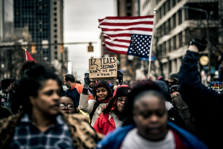 Protesters march through downtown Cleveland in 2016 after police shot and killed 12-year-old Tamir Rice, who was playing with a toy gun in a park. (Michael Nigro/Getty Images)