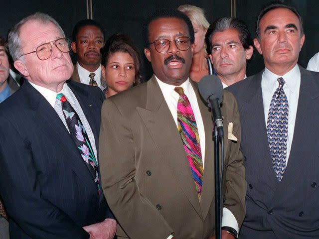 <p>POOL/AFP/Getty</p> F. Lee Bailey, Johnnie Cochran Jr., Robert Kardashian, and Robert Shapiro hold a joint press conference on September 6, 1995.