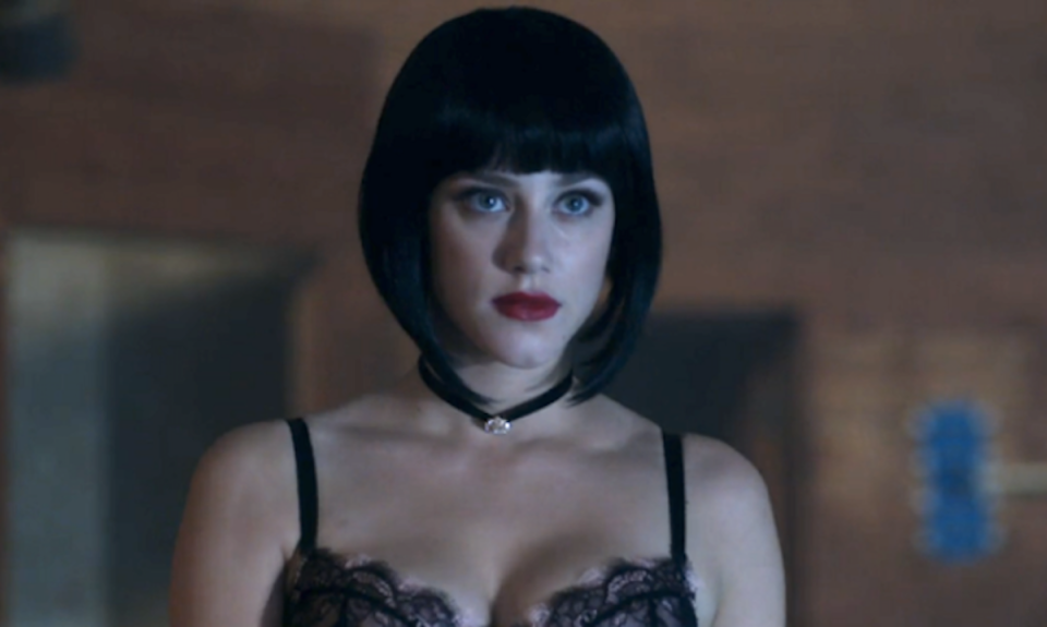 Betty shows off her dark side with a dark wig, naturally. (Photo: The CW)