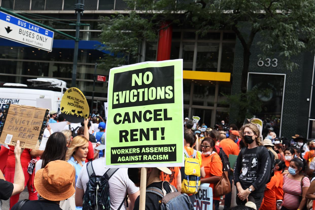 People gather at the Manhattan office of New York Gov. Kathy Hochul calling for a stop to evictions. 