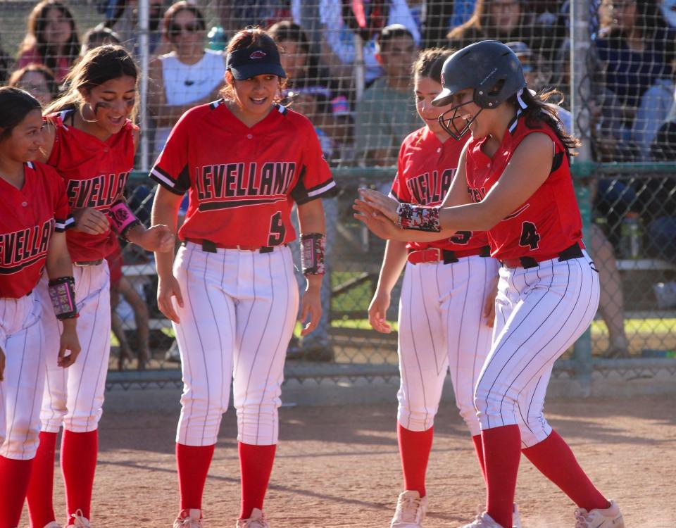 Levelland's Natalie Coronado dances into home after a home run against Snyder in a District 5-4A softball game on Friday, April 21, 2023 at Levelland High School.