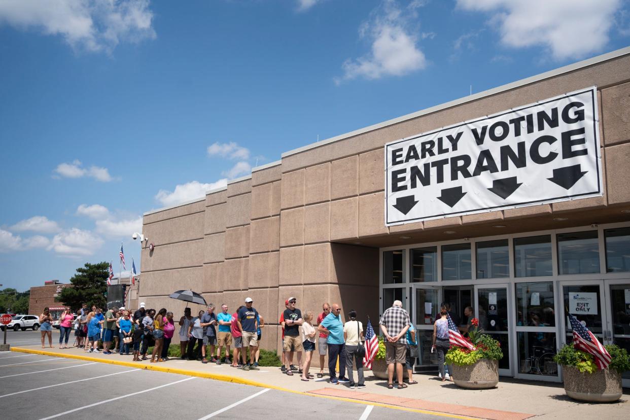 A line extends outside the Franklin County Board of Elections building Friday during early voting for Issue 1.