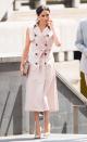 <p>Meghan Markle stepped out in a blush-colored trench dress by <a class="link " href="https://www.houseofnonie.com/the-brand.html" rel="nofollow noopener" target="_blank" data-ylk="slk:House of Nonie;elm:context_link;itc:0;sec:content-canvas">House of Nonie</a> paired with a matching clutch from Mulberry and coordinating Dior pumps. She wore the look <a href="https://www.townandcountrymag.com/style/fashion-trends/a22200767/meghan-markle-classic-trench-coat-nelson-mandela-exhibit/" rel="nofollow noopener" target="_blank" data-ylk="slk:while attending;elm:context_link;itc:0;sec:content-canvas" class="link ">while attending</a> the opening of the Nelson Mandela Centenary Exhibition with Prince Harry.</p>