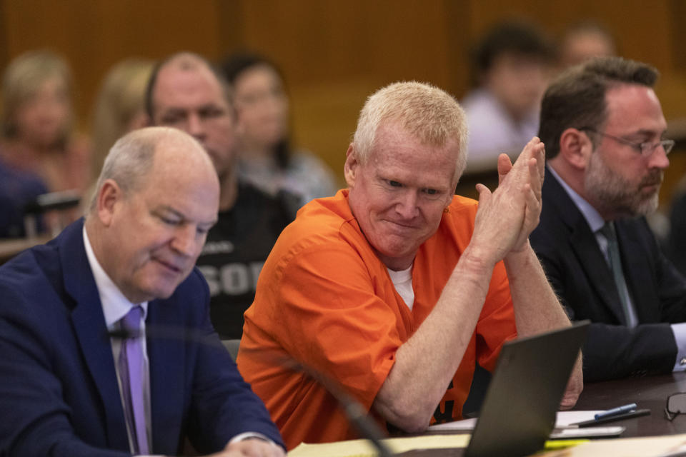 Alex Murdaugh, center, talks with his defense attorney Jim Griffin, left, during a jury-tampering hearing at the Richland County Judicial Center, Monday, Jan. 29, 2024, in Columbia, S.C. (Andrew J. Whitaker/The Post And Courier via AP, Pool)