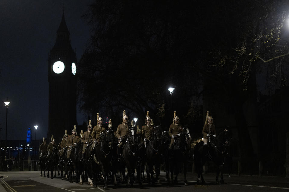 A night time rehearsal for the coronation of King Charles III passes the Houses of Parliament on April 18.<span class="copyright">Dan Kitwood—Getty Images</span>