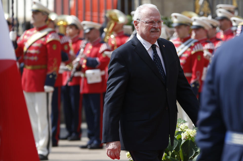 President of Slovakia Ivan Gasparovic inspects the guard of honor upon his arrival for a meeting on the 5th anniversary of the Eastern Partnership at the Prague Castle in Prague, Czech Republic, Thursday, April 24, 2014. (AP Photo/Petr David Josek)