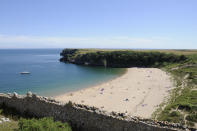 Another National Trust beach, the intimate Lundy Bay is home to a collapsed sea-cave where visitors can enjoy rock pooling at low tide. At high tide, enjoy the clifftop views above where you can bask in the beauty of the surrounding Polzeath. [Photo: Getty]