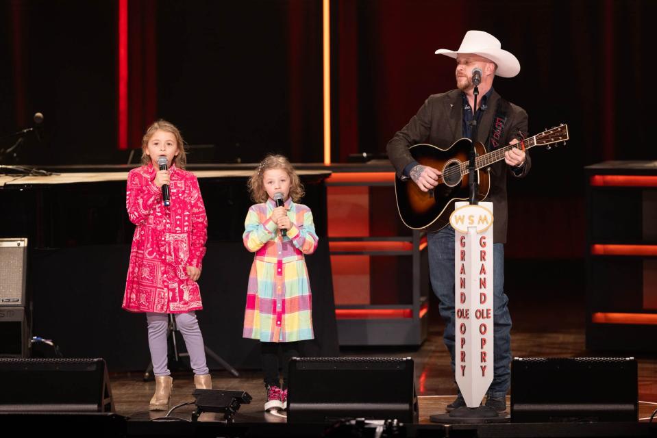 Clara Mae, Cori and Cody Johnson at the Grand Ole Opry, Feb. 1, 2024