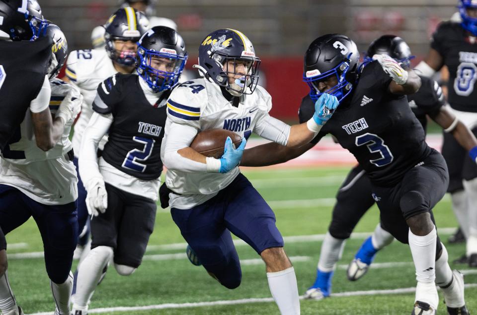 Toms River North's Josh Moore carries the ball against Passaic Tech in the NJSIAA Group 5 championship game at Rutgers University on November 27, 2023.