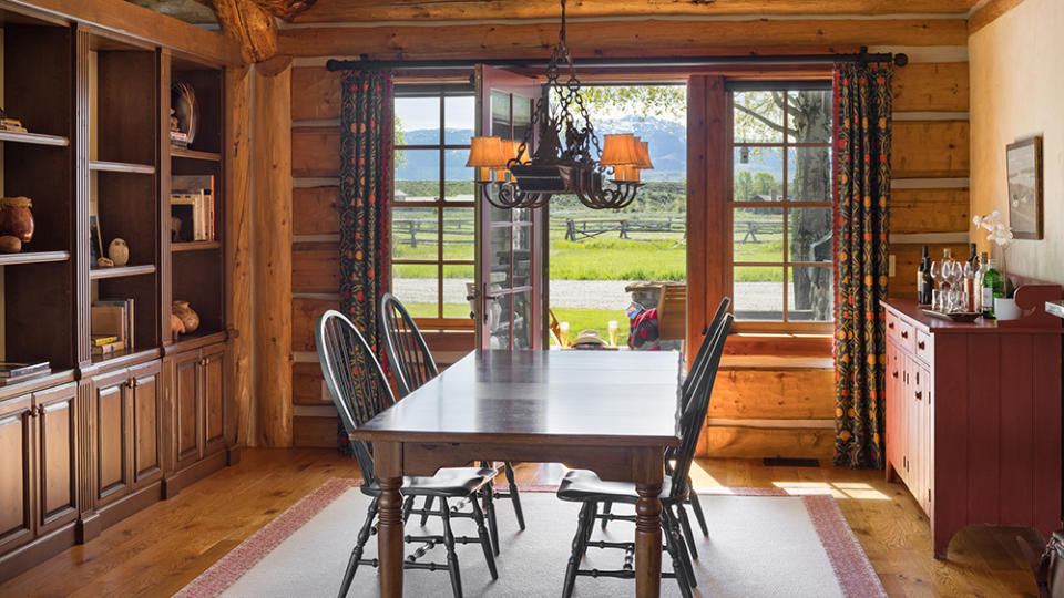 This dining area opens right up to the incredible outdoor space. - Credit: Aaron Kraft/Krafty Photos