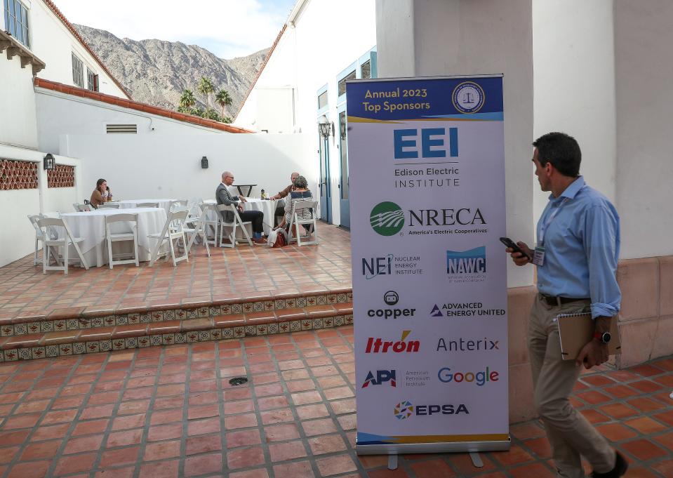 A sign at the National Association of Regulatory Utility Commissioners annual meeting displays the top sponsors of the event at the La Quinta Hotel and Resort in La Quinta, Calif., Nov. 13, 2023.