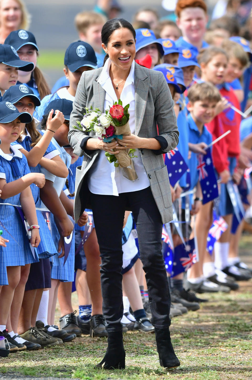 <p>She opted for a AU$203 grey blazer from the tennis champ’s brand Serena Williams Collection, which she paired with $200 Aussie jeans by <a rel="nofollow noopener" href="https://www.outlanddenim.com.au/women/" target="_blank" data-ylk="slk:Outland Denim;elm:context_link;itc:0;sec:content-canvas" class="link ">Outland Denim</a> and a white shirt from Frech label Maison Kitsune. Photo: Getty </p>