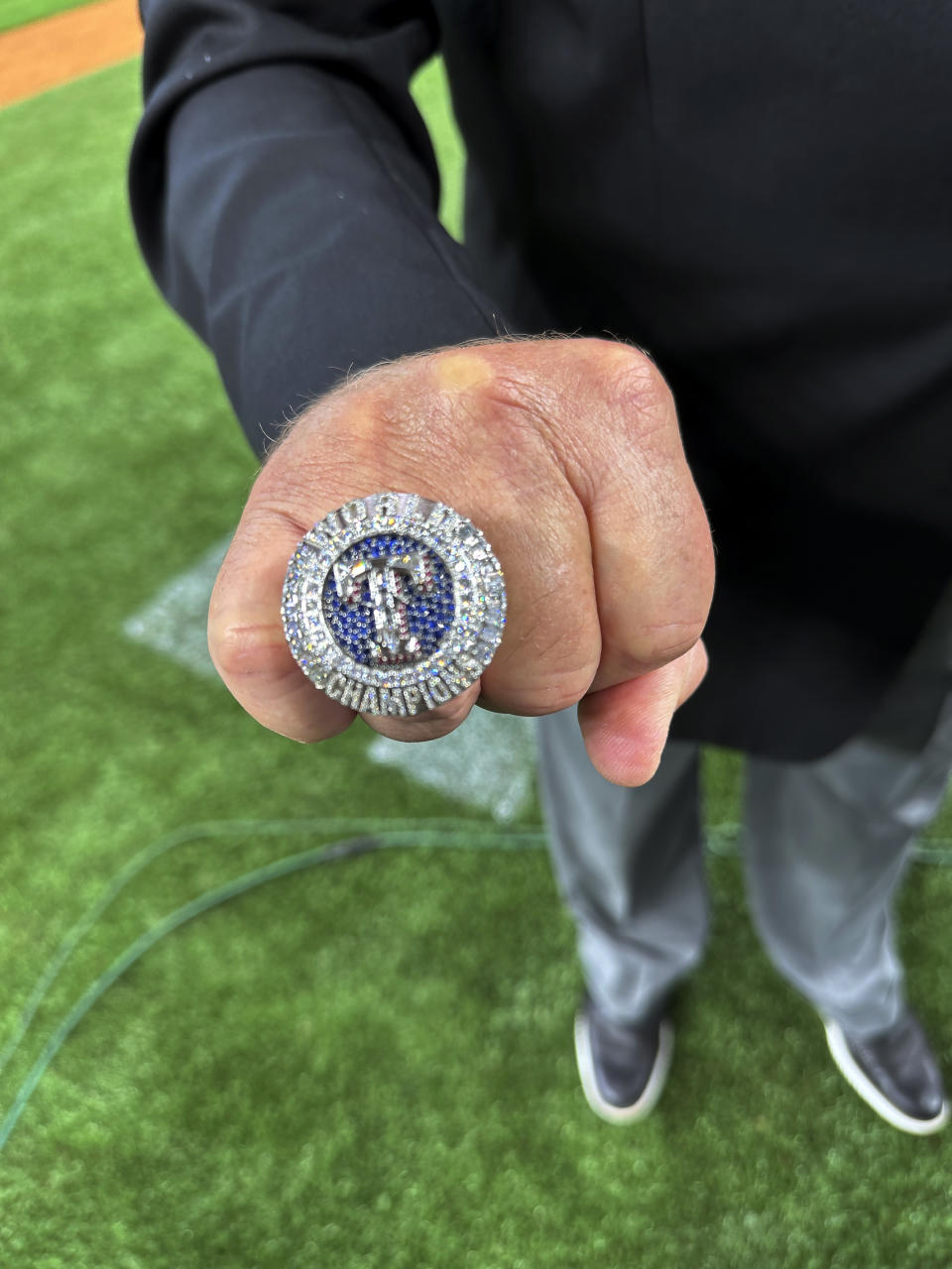 The Texas Rangers championship ring is seen Saturday, March 30, 2024 in Arlington Texas. The Texas Rangers and staff will receive their World Series championship rings during a pre-game ceremony before the Texas Rangers take on the Chicago Cubs in a baseball game. (AP Photo/Stephen Hawkins)