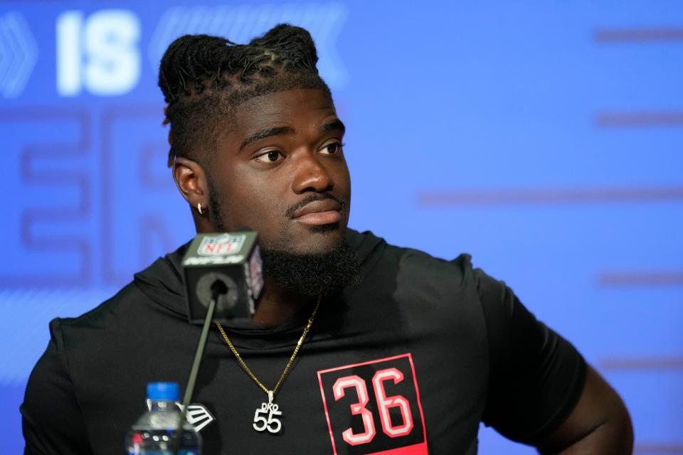 Michigan defensive lineman David Ojabo speaks during a news conference at the NFL combine in Indianapolis on Friday, March 4, 2022.
