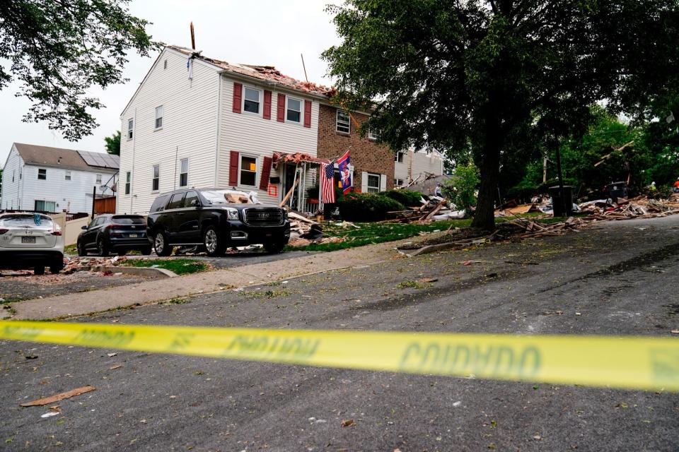 Mandatory Credit: Photo by Matt Rourke/AP/Shutterstock (12960725p) Caution tape cordons off the scene of a deadly explosion in a residential neighborhood in Pottstown, Pa., . A house exploded northwest of Philadelphia, killing several people and leaving others injured, authorities said Friday Fatal Home Explosion, Pottstown, United States - 27 May 2022