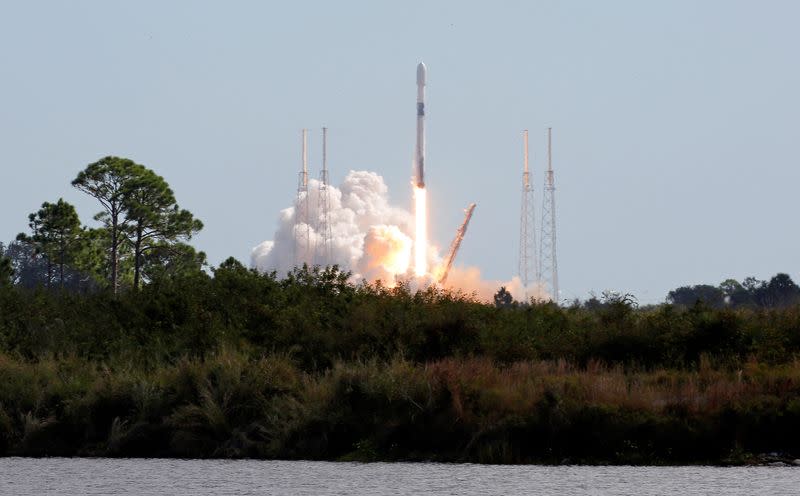 FILE PHOTO: SpaceX launches a Falcon 9 rocket carrying a pair of television broadcasting satellites for Intelsat from launch pad 40