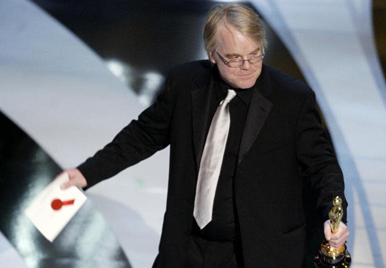 US actor Philip Seymour Hoffman accepts his Oscar for Best Actor on March 5, 2006 during the 78th Academy Awards at the Kodak Theater in Hollywood, California