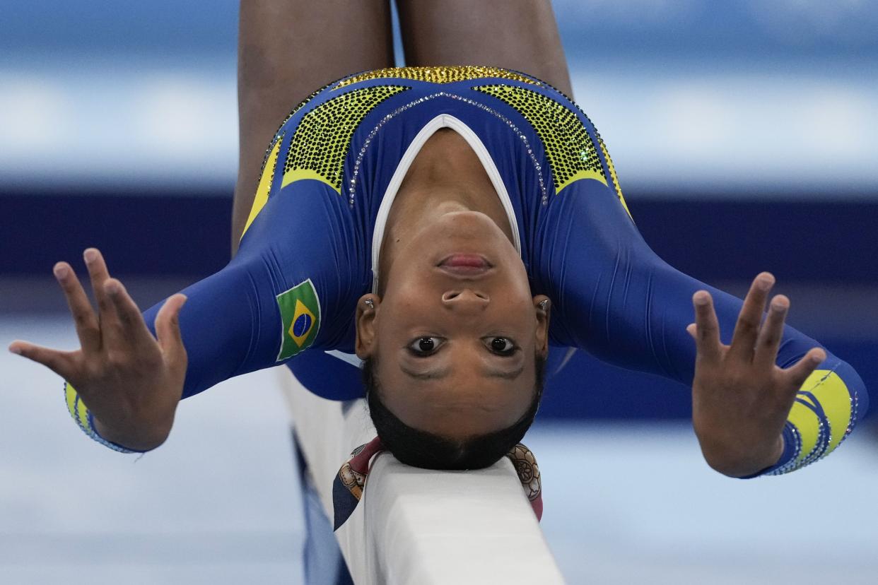 Rebeca Andrade, of Brazil, performs on the balance beam during the artistic gymnastics women's all-around final at the 2020 Summer Olympics, Thursday, July 29, 2021, in Tokyo, Japan.