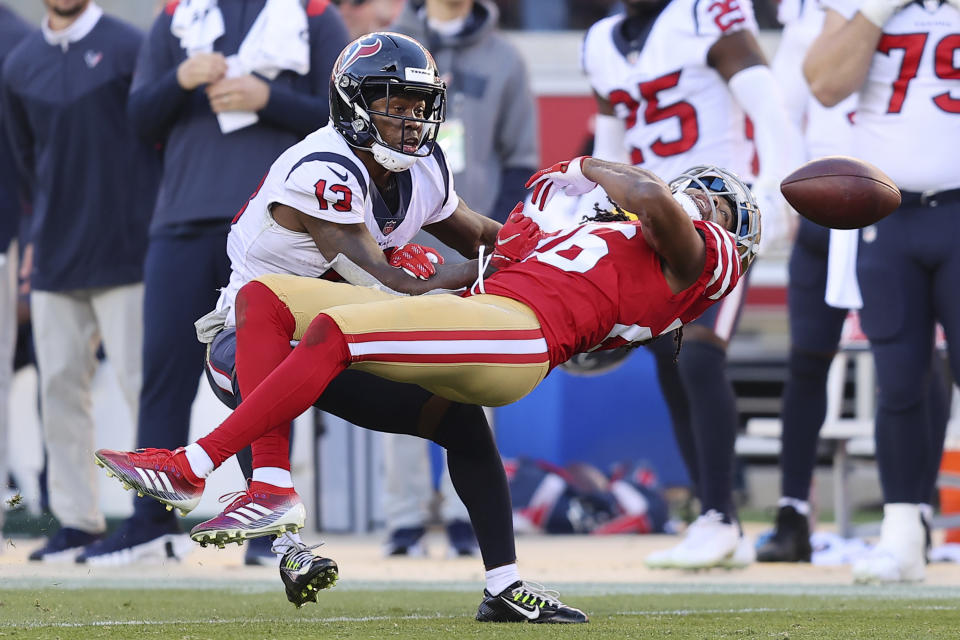 San Francisco 49ers cornerback Josh Norman, right, is called for a penalty on a pass intended for Houston Texans wide receiver Brandin Cooks (13) during the second half of an NFL football game in Santa Clara, Calif., Sunday, Jan. 2, 2022. (AP Photo/John Hefti)