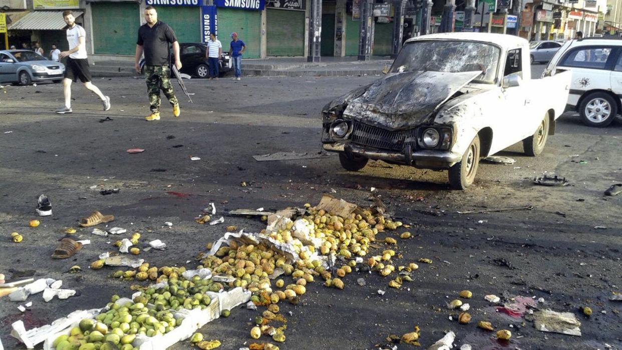 Nach Selbstmordanschlägen in der von der syrischen Regierung kontrollierten Stadt Al-Suwaida. Foto: SANA/AP