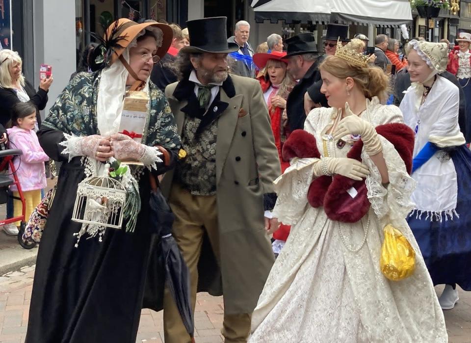 People dressed as Dickensian literary characters take part in parade at the Platinum Jubilee Dickens Festival in Rochester (Katie Boyden/PA) (PA Wire)