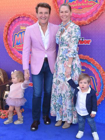 <p>LISA O'CONNOR/AFP/Getty</p> Robert Herjavec, Kym Johnson and kids Haven Mae Herjavec, Hudson Robert Herjavec walk the carpet during Disney Juniors "Mira, Royal Detective," world premiere.