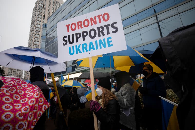 People rally outside the Ukrainian Consulate in Toronto