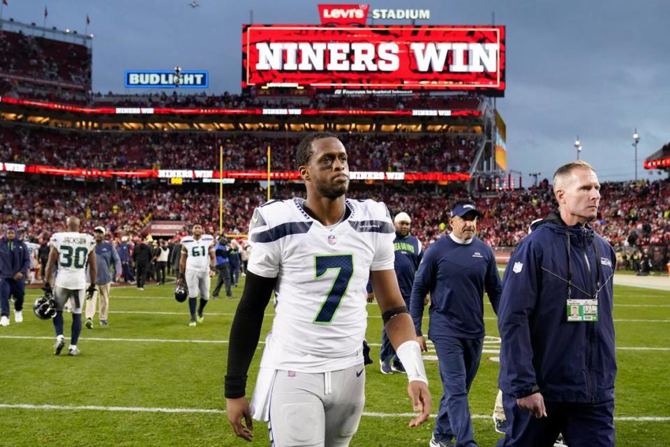 Seattle Seahawks quarterback Geno Smith (7) walks off the field after an NFL wild card playoff football game against the San Francisco 49ers in Santa Clara, Calif., Saturday, Jan. 14, 2023. (AP Photo/Godofredo A. Vásquez)