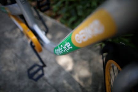 A GrabCycle oBike bicycle is seen on a street in Singapore March 9, 2018. Thomas White